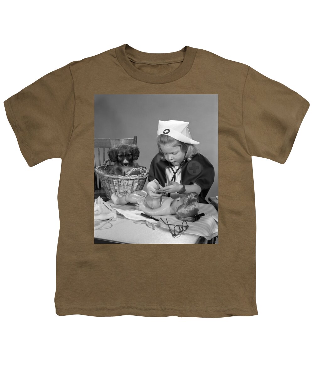 1950s Youth T-Shirt featuring the photograph Girl Playing Doctor, C.1950s by H. Armstrong Roberts/ClassicStock