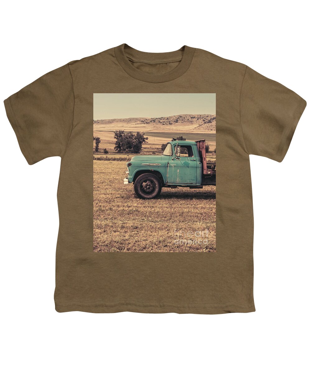 Ranch Youth T-Shirt featuring the photograph Old Hay truck in the field by Edward Fielding