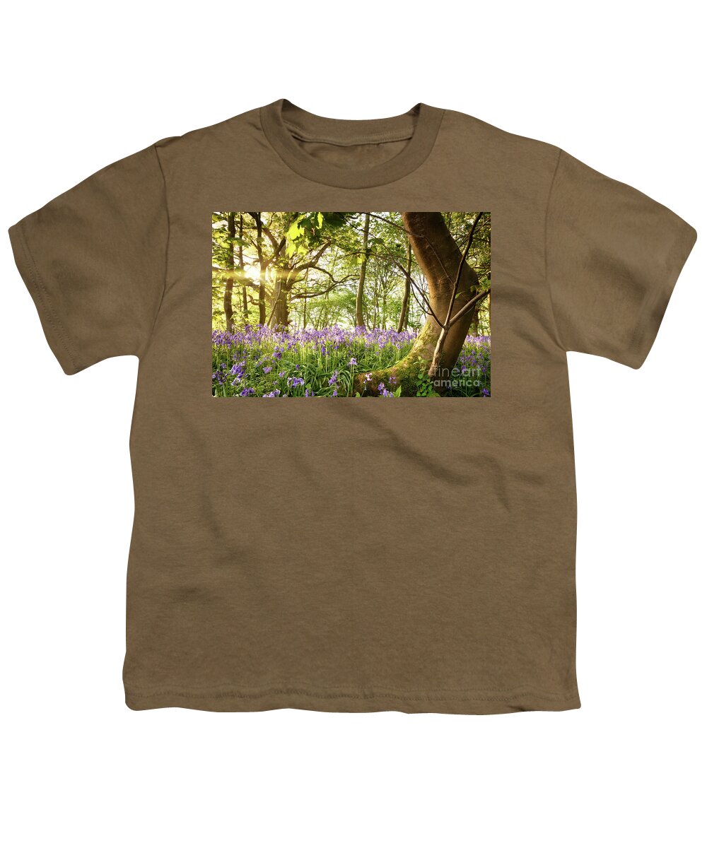 Forest Youth T-Shirt featuring the photograph Bent tree in bluebell forest by Simon Bratt