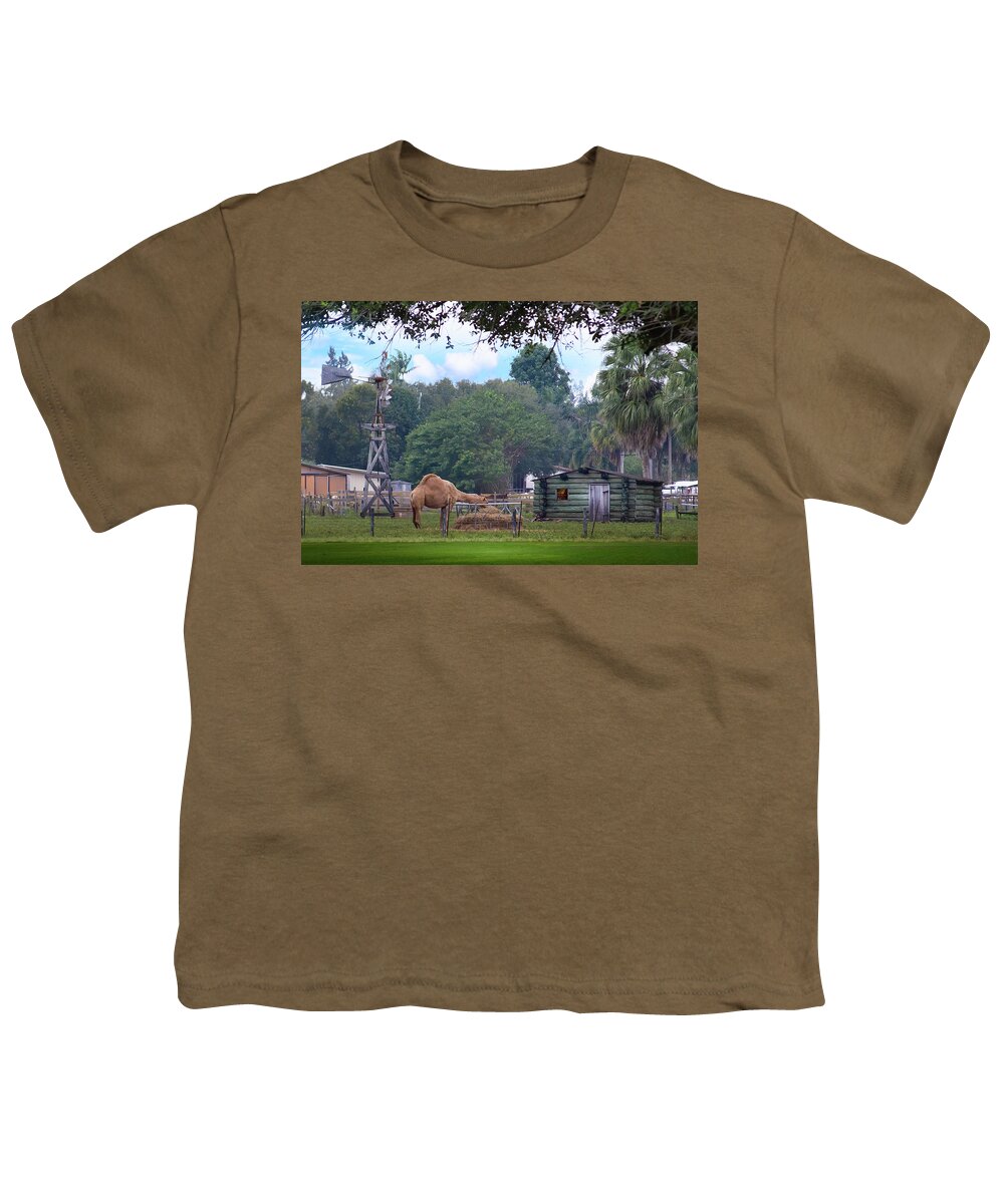 Camel Youth T-Shirt featuring the photograph A Camel, A Windmill, And A Log Cabin by Mark Andrew Thomas