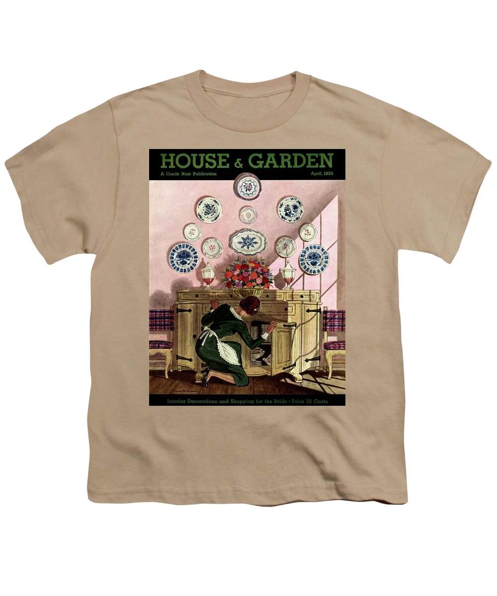 House And Garden Youth T-Shirt featuring the photograph A Maid Getting China From A French Provincial by Pierre Brissaud