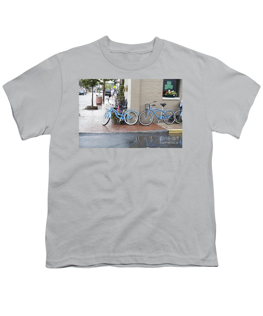 Bicycles Youth T-Shirt featuring the photograph Bicycles parked along the main street in Saint Michaels Maryland. by William Kuta