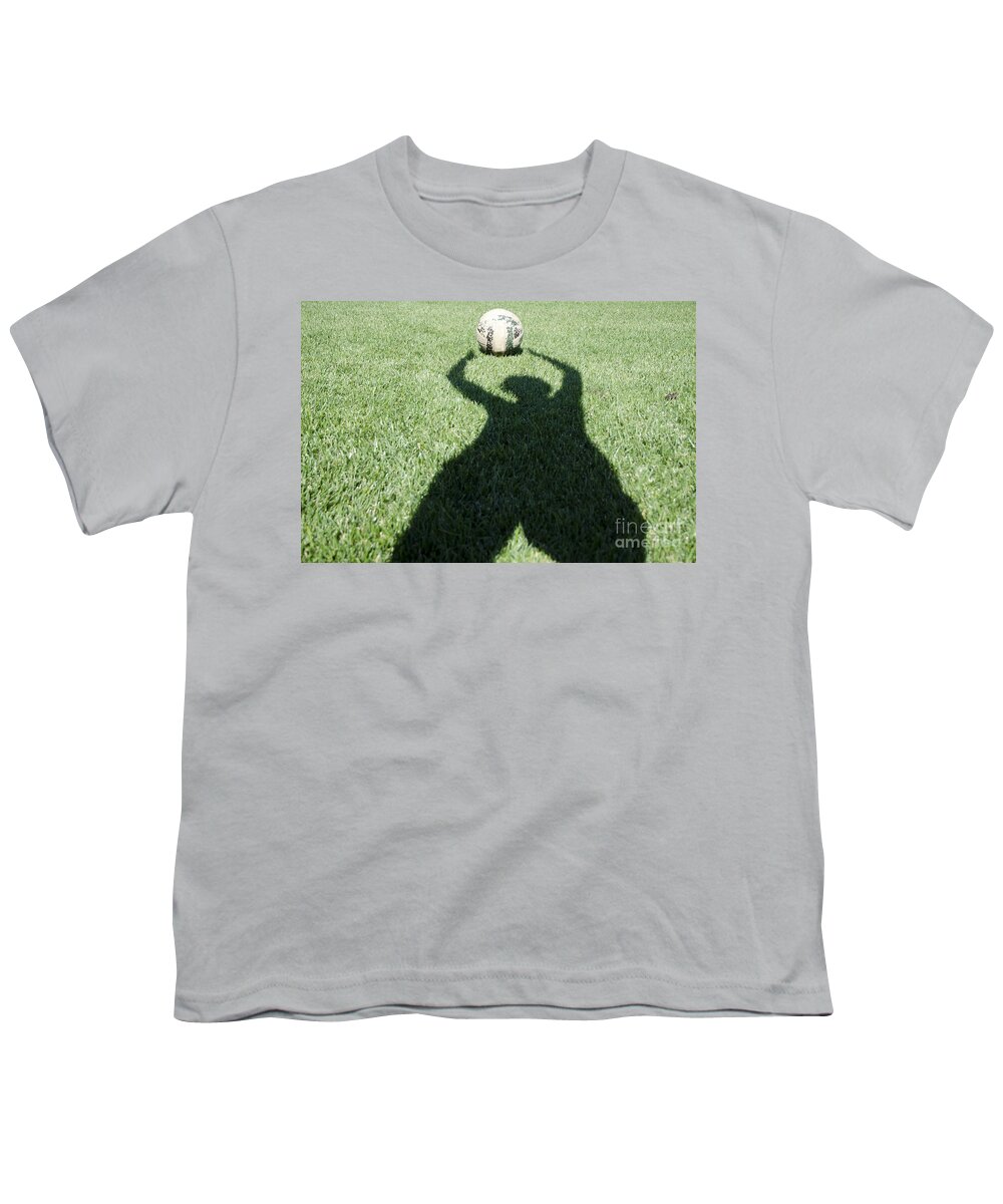 Football Youth T-Shirt featuring the photograph Shadow playing football by Mats Silvan