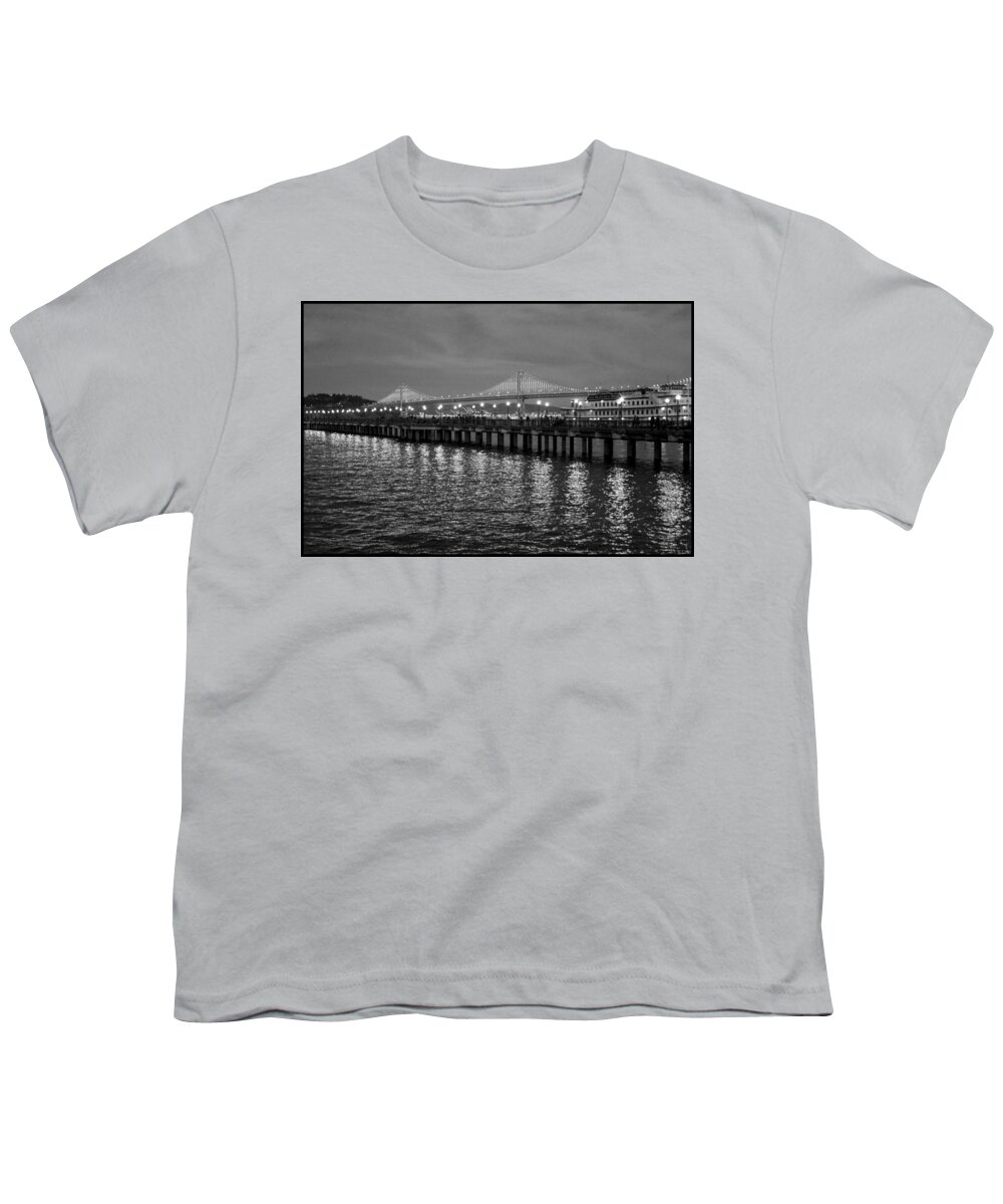 Bonnie Follett Youth T-Shirt featuring the photograph Pier 7 and Bay Bridge Lights at Sunset BW by Bonnie Follett