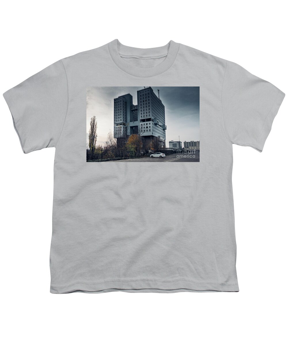 City Youth T-Shirt featuring the photograph Abandoned building in centre of city by Marina Usmanskaya