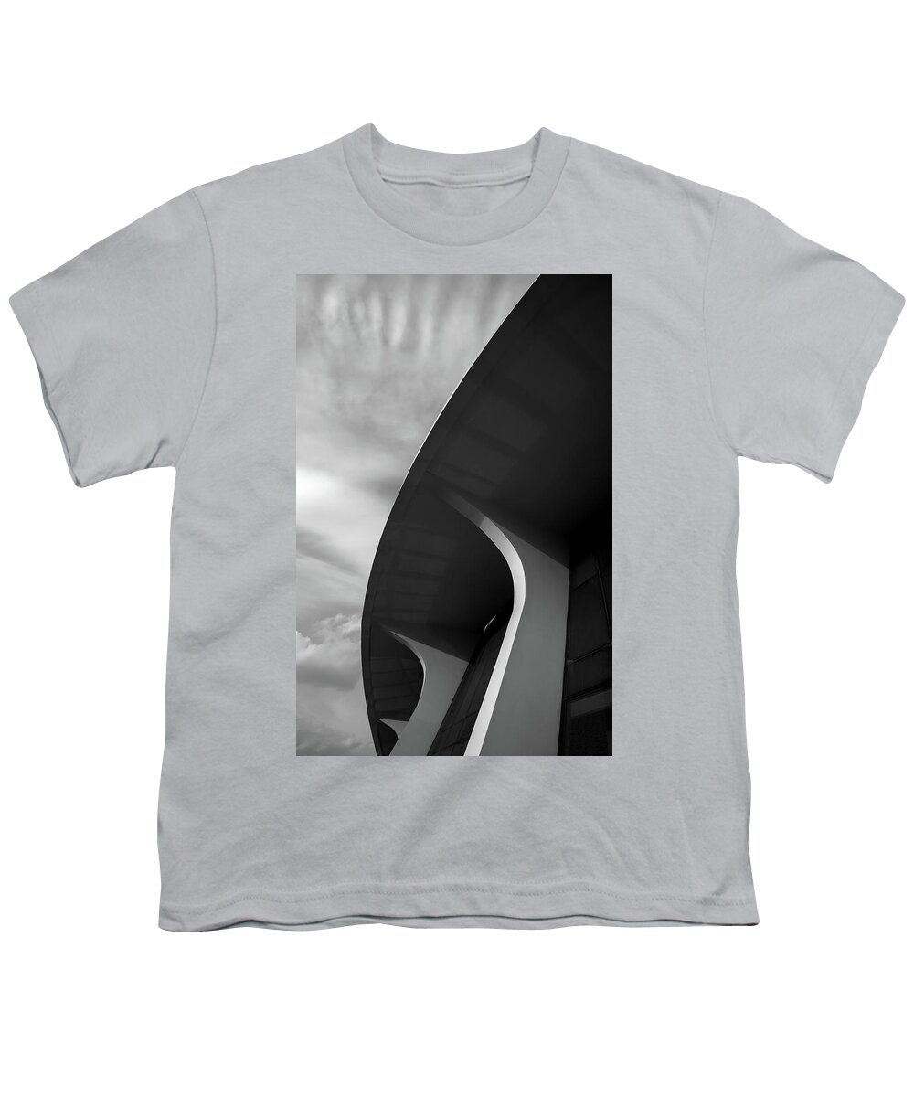 Architecture Youth T-Shirt featuring the photograph Abstract architecture design. Black and white futuristic exterio by Michalakis Ppalis