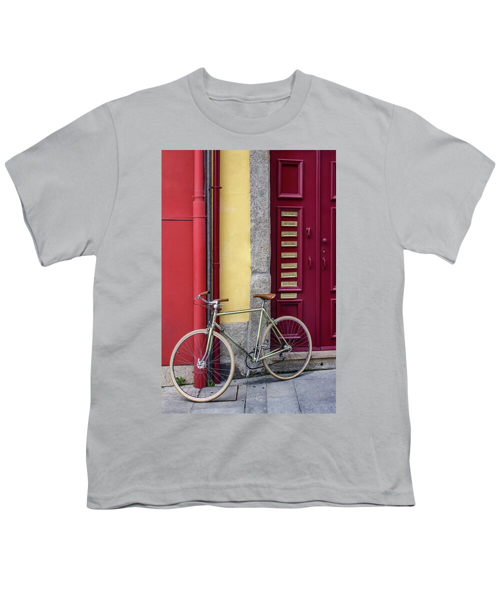 Parked Bicycle Youth T-Shirt featuring the photograph Red door and bicycle by Carlos Caetano