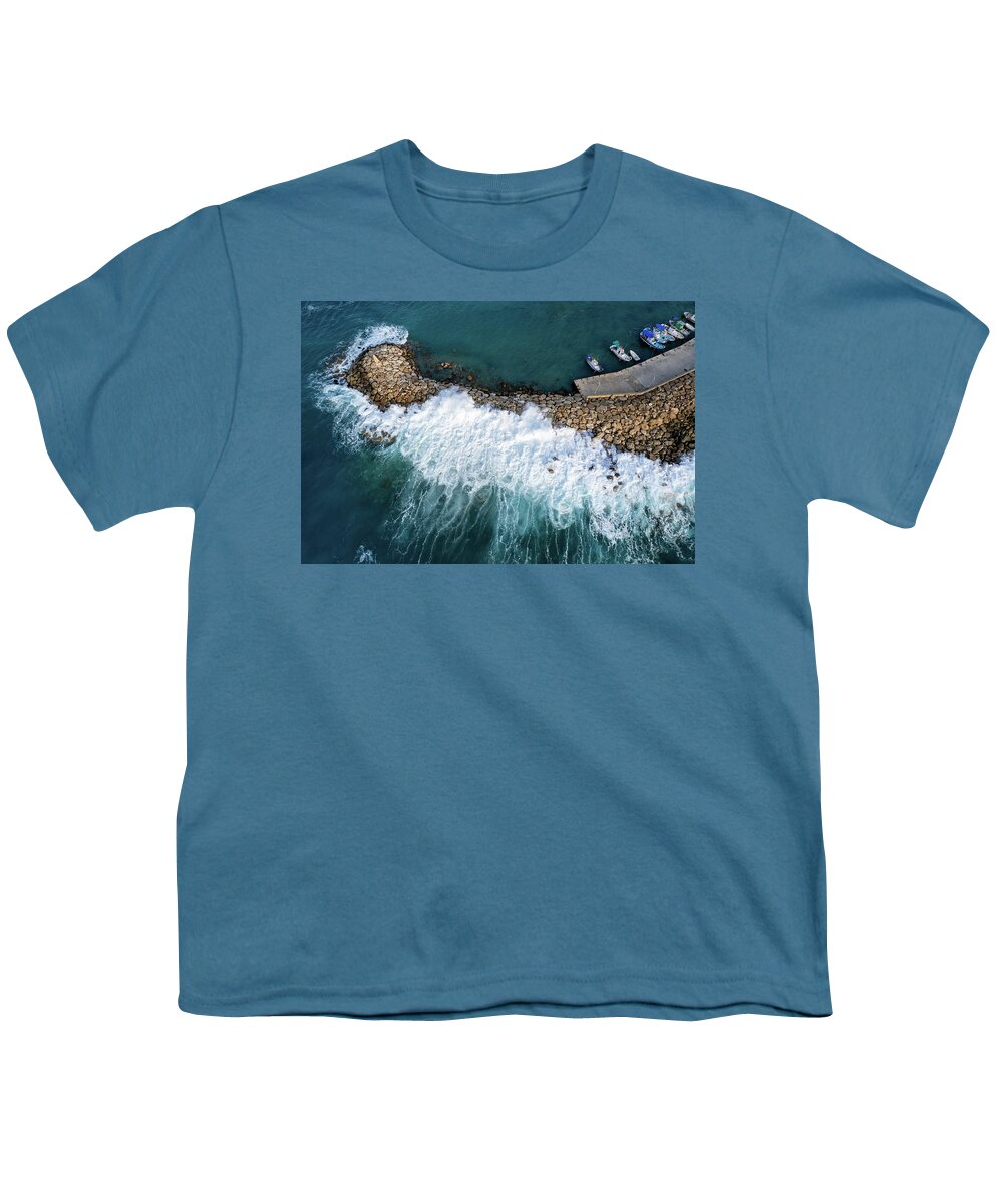 Brakewater Youth T-Shirt featuring the photograph Stormy windy waves on the shore. Drone photography. by Michalakis Ppalis