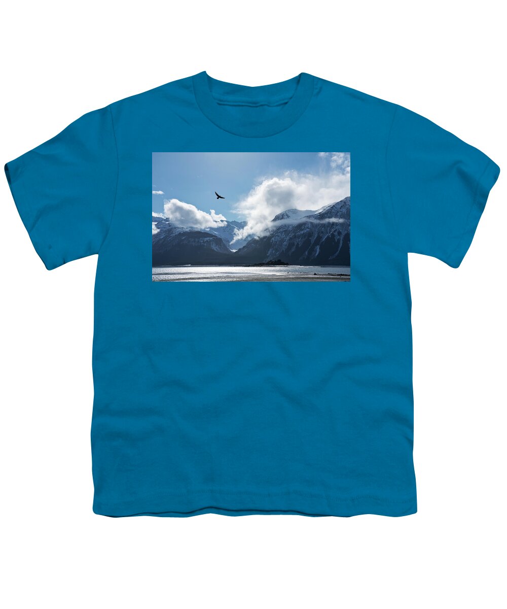 Alaska Youth T-Shirt featuring the photograph Eagle flying over the Chilkat Inlet by Michele Cornelius