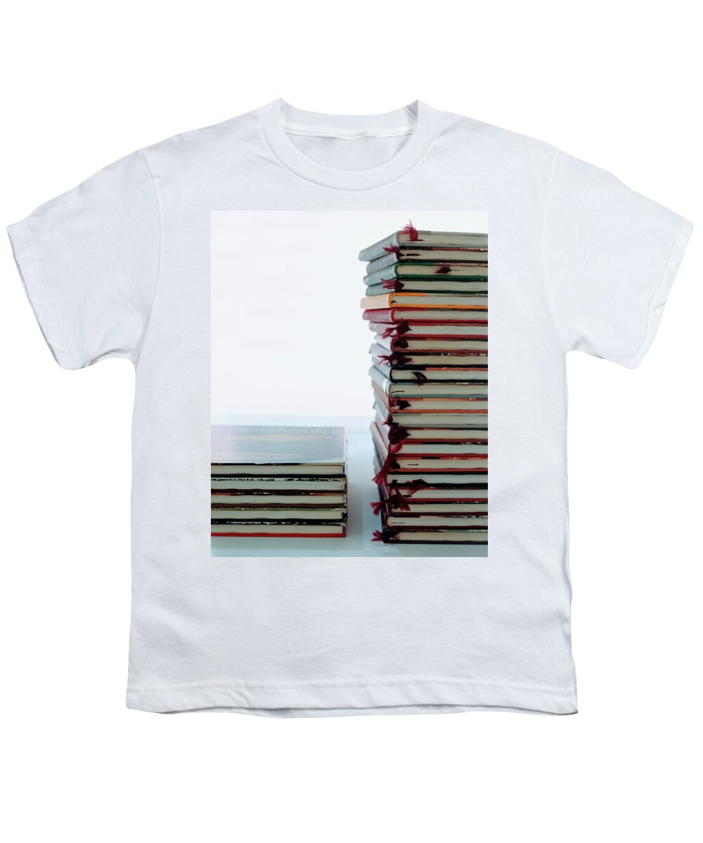 Arts Youth T-Shirt featuring the photograph Two Stacks Of Books by Romulo Yanes