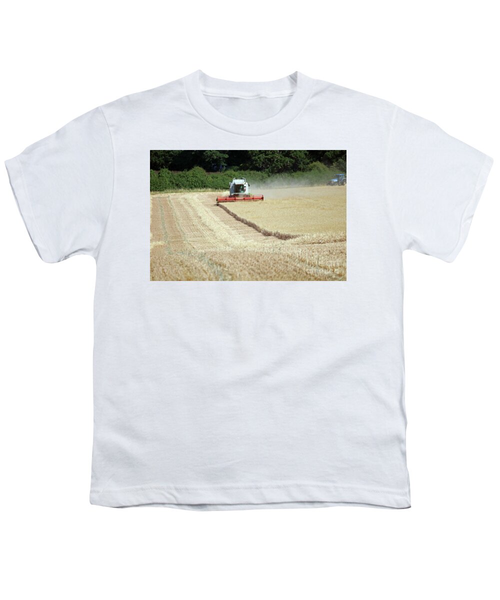 Harvest England Wheat Corn Harvesting Combine Summer English Landscape Summer Youth T-Shirt featuring the photograph Bringing in the harvest England by Julia Gavin