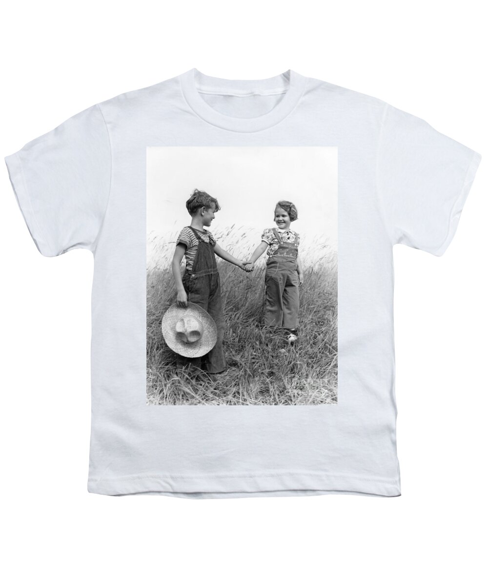 1930s Youth T-Shirt featuring the photograph Farm Kids Holding Hands, C.1930-40s by H. Armstrong Roberts/ClassicStock