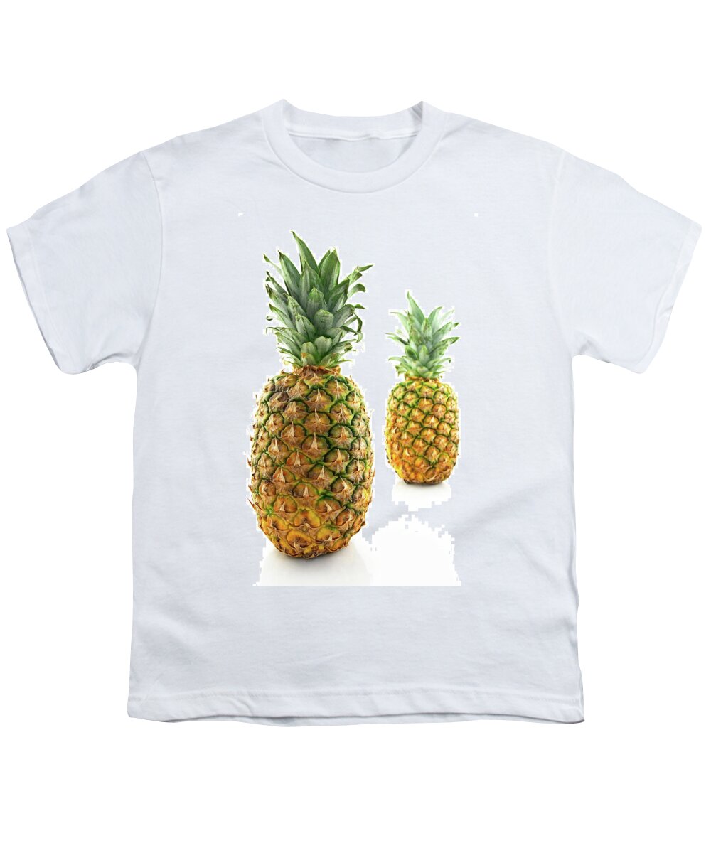 Pineapple Youth T-Shirt featuring the photograph Two ripe pineapples, focus on the closest one by GoodMood Art