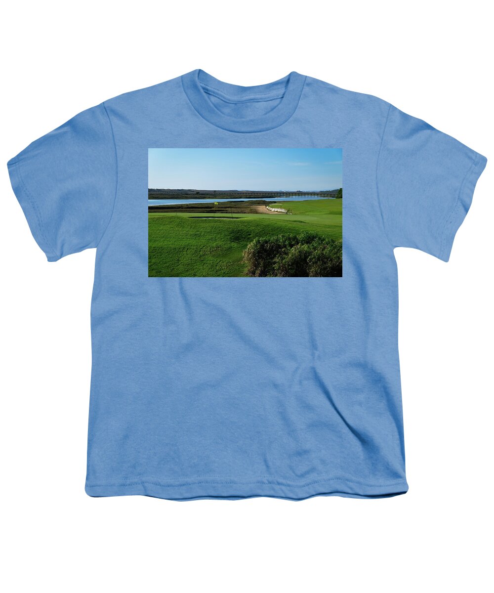 Golf Course Youth T-Shirt featuring the photograph Golf course and Ria Formosa in Quinta do Lago by Angelo DeVal