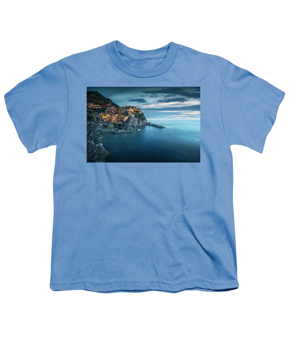 Manarola Youth T-Shirt featuring the photograph Manarola village, rocks and sea in blue hour. Cinque Terre, Ital by Stefano Orazzini