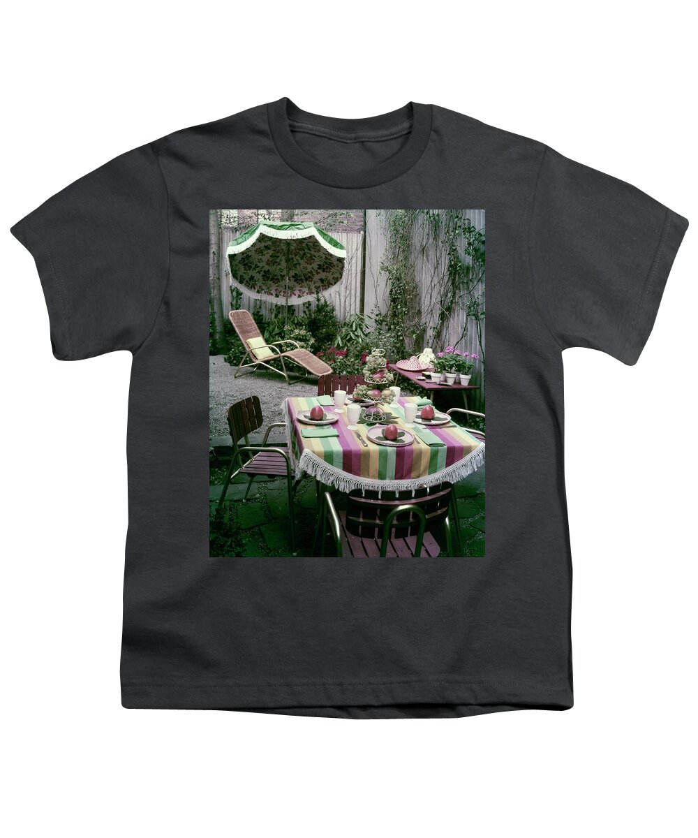 Harold Schwartz Youth T-Shirt featuring the photograph A Garden Set Up For Lunch by Tom Leonard