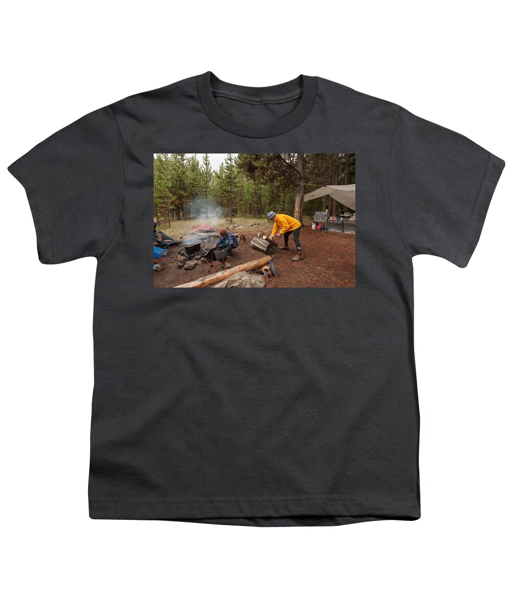 Wyoming Youth T-Shirt featuring the photograph Jorge Sawing Wood by Brenda Jacobs
