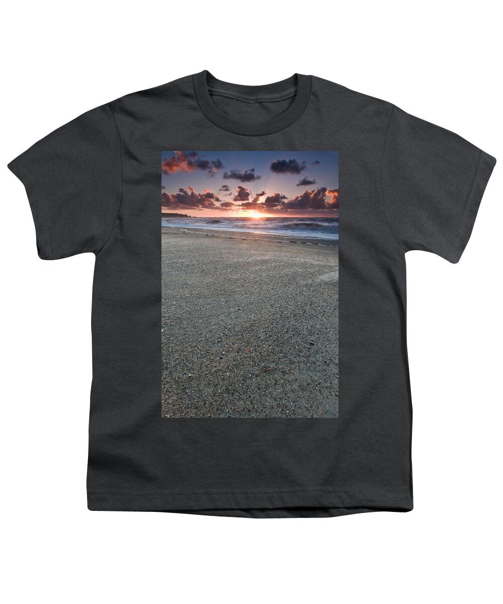 Beach Youth T-Shirt featuring the photograph A beach during sunset with glowing sky by U Schade