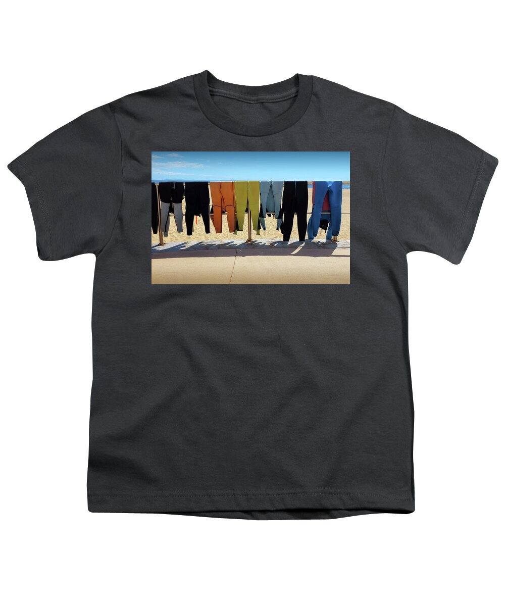 Adventure Youth T-Shirt featuring the photograph Drying Wet Suits by Carlos Caetano