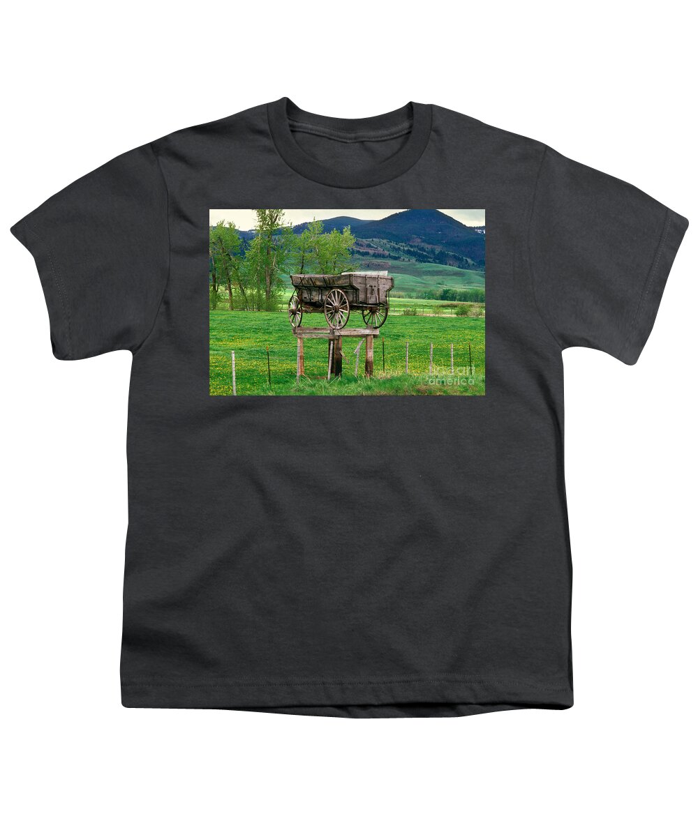 Freight Wagon Youth T-Shirt featuring the photograph Old Time Freight Wagon in Montana by Wernher Krutein