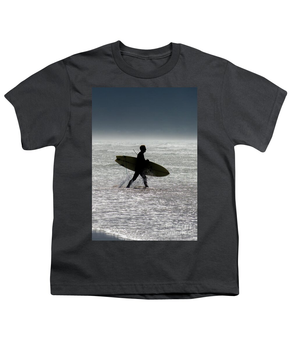 Surfing Youth T-Shirt featuring the photograph Silhouette Surfer at Beach by Andreas Berthold