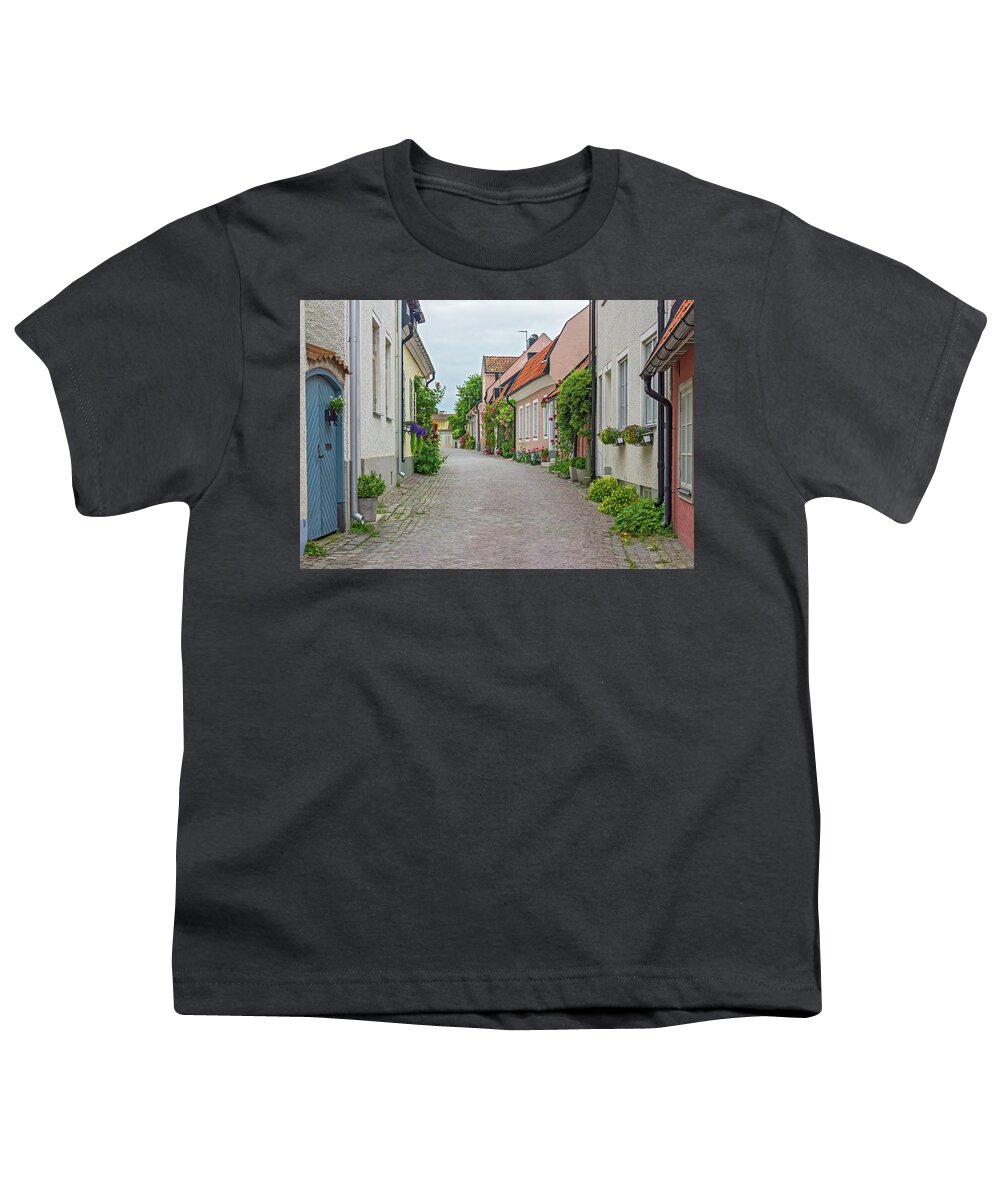 Street Youth T-Shirt featuring the photograph Street with old houses in a Swedish town Visby by GoodMood Art
