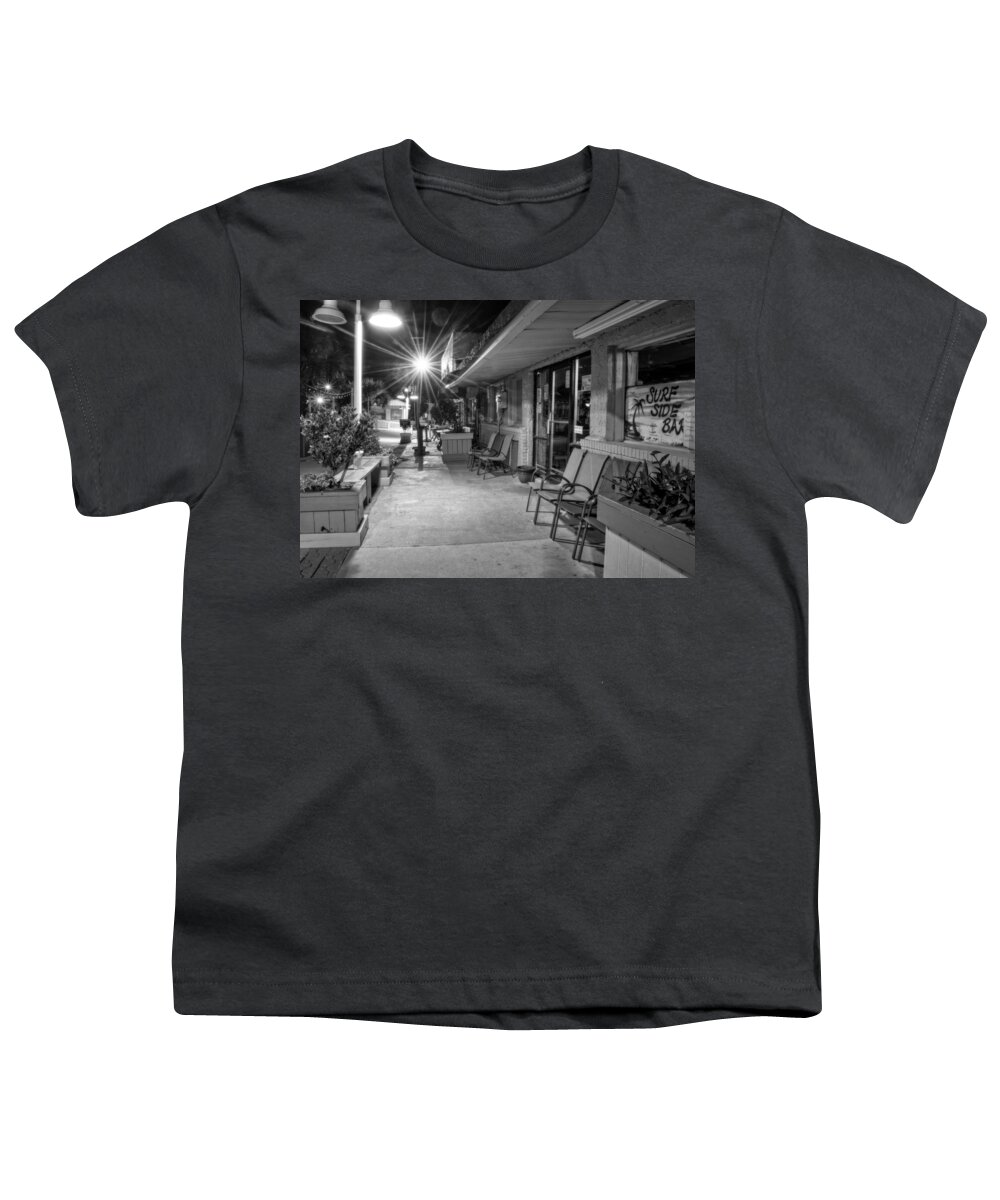 Surf Side Bar Youth T-Shirt featuring the photograph Surf Side Bar At Night in Black and White by Greg and Chrystal Mimbs