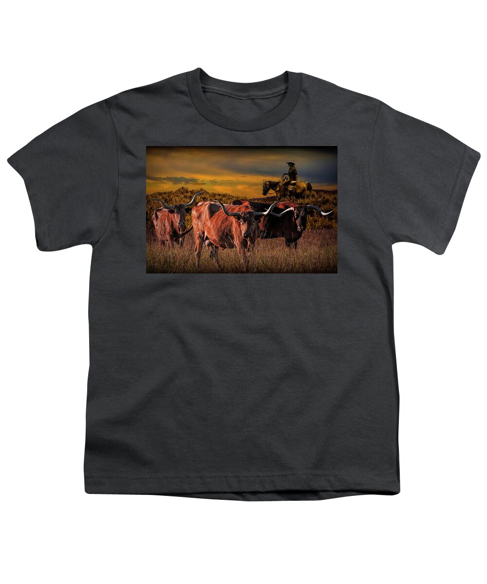Longhorn Youth T-Shirt featuring the photograph Texas Longhorn Steers and Cowboy at Sunset by Randall Nyhof