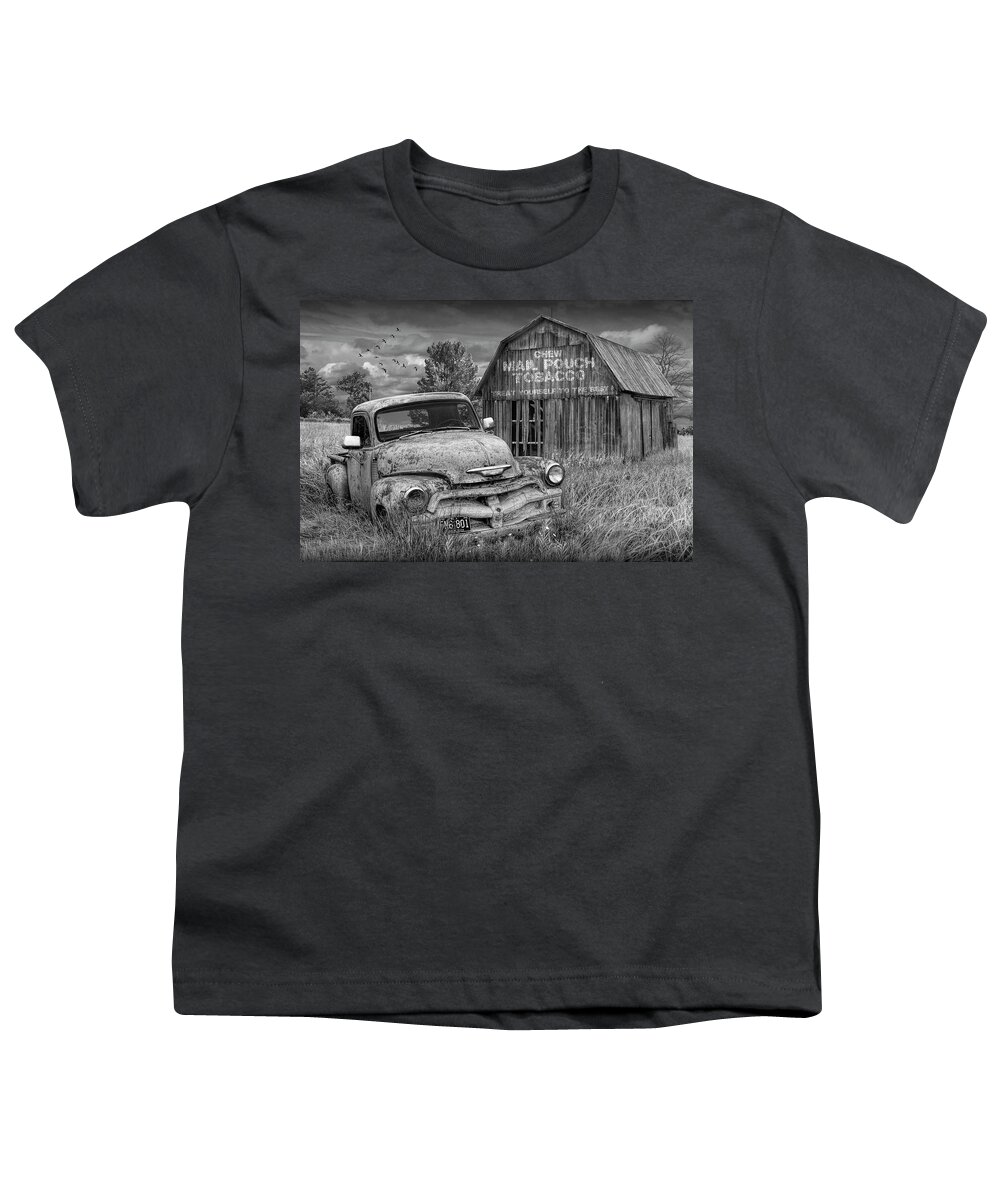 Chevy Youth T-Shirt featuring the photograph Black and White of Rusted Chevy Pickup Truck in a Rural Landscape by a Mail Pouch Tobacco Barn by Randall Nyhof