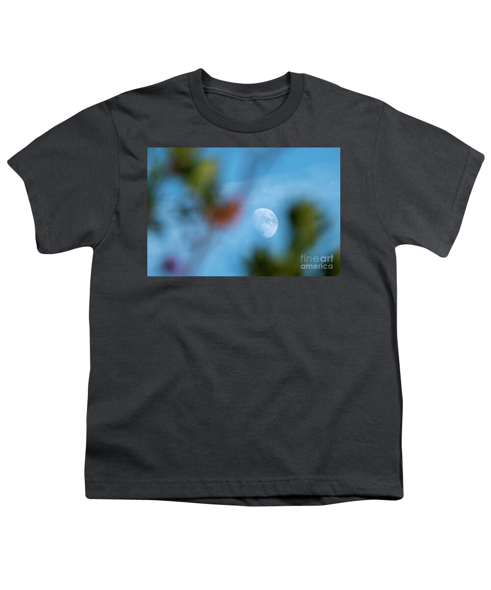 Nature Youth T-Shirt featuring the photograph Waxing Gibous Moon Between Trees Blue Sky Costa Ballena Cadiz by Pablo Avanzini