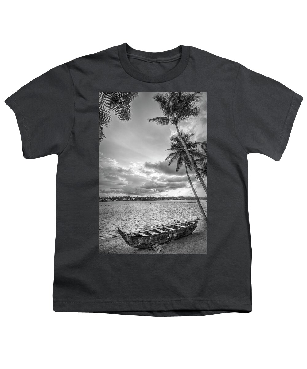 African Youth T-Shirt featuring the photograph Wooden Boat on the Beach Black and White by Debra and Dave Vanderlaan