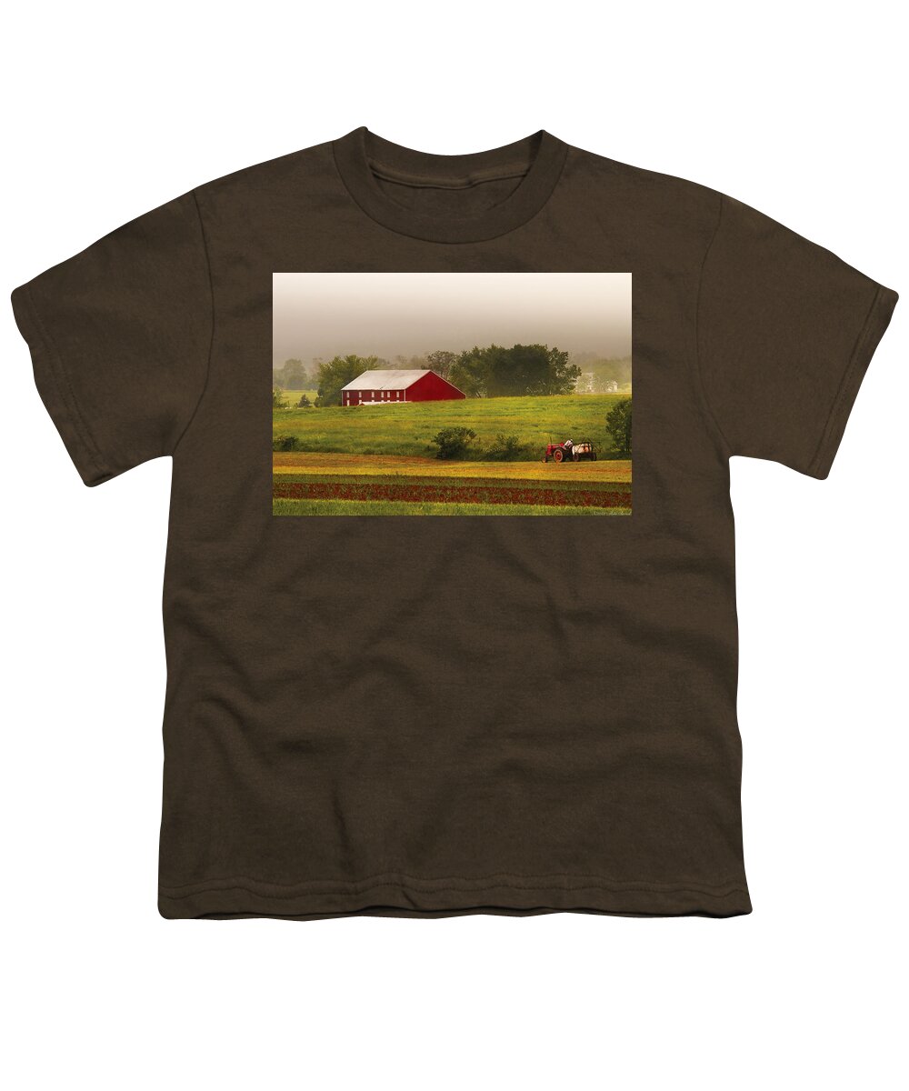 Savad Youth T-Shirt featuring the photograph Farm - Farmer - Tilling the fields by Mike Savad