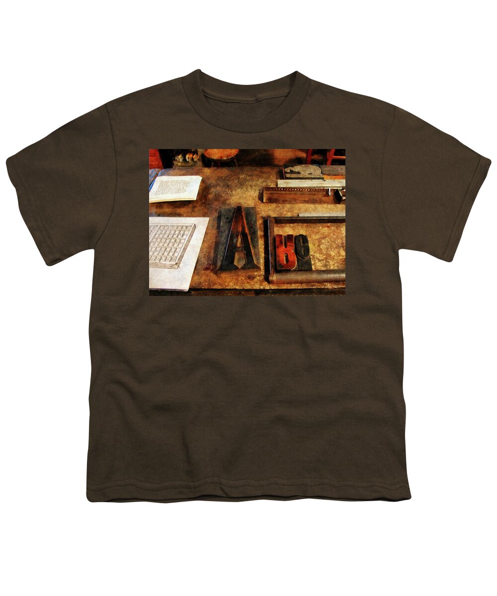 A Youth T-Shirt featuring the photograph Capital A by Susan Savad