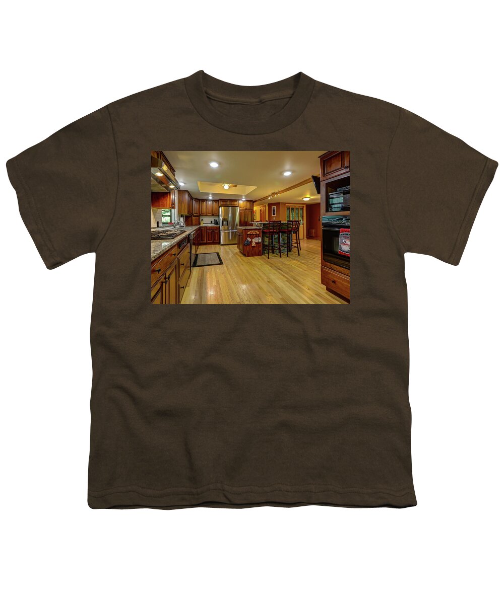 Real Estate Photography Youth T-Shirt featuring the photograph This is the kitchen and dining room of the Burns Rd Chalet by Jeff Kurtz