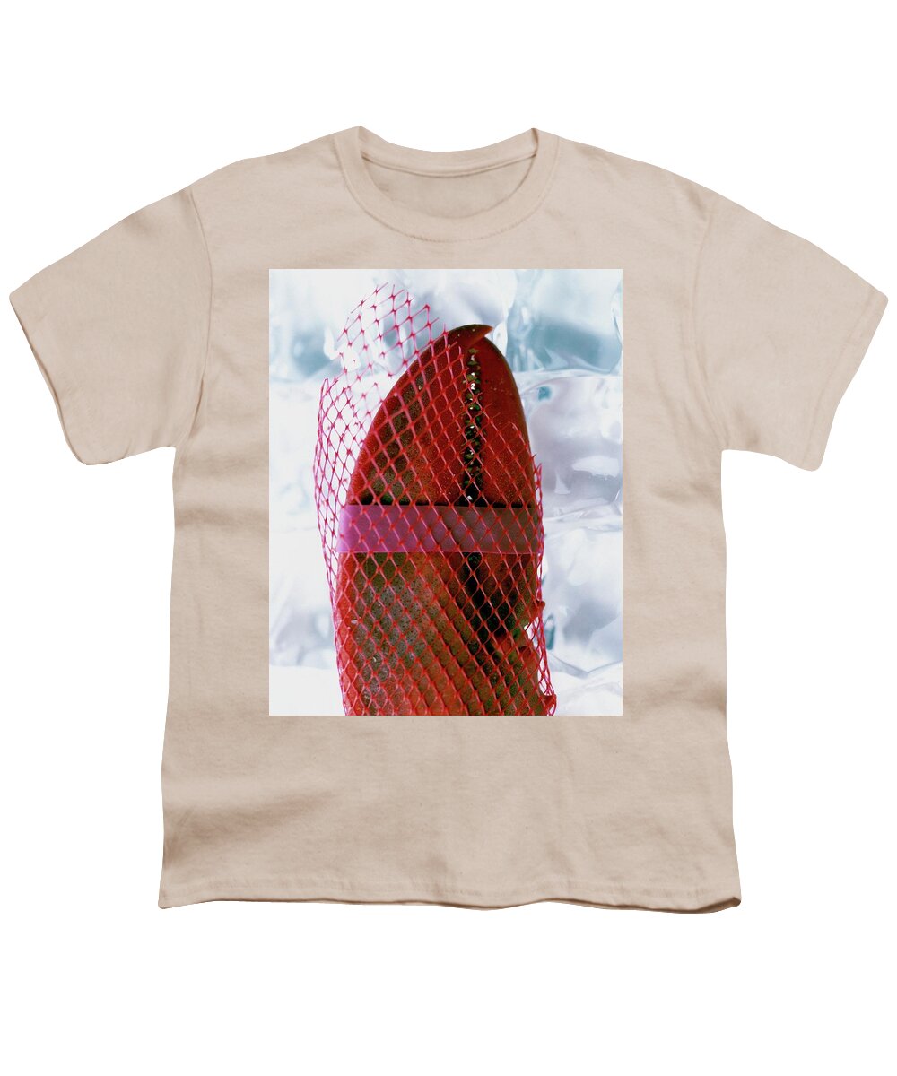 Cooking Youth T-Shirt featuring the photograph A Lobster Claw In Red Packaging by Romulo Yanes