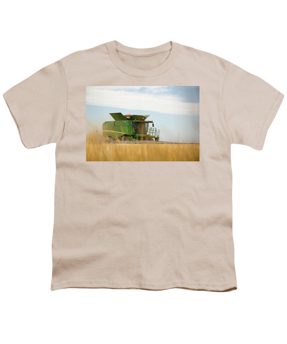 Combine Youth T-Shirt featuring the photograph Combine Cuts Wheat In Northeast by Kevan Dee