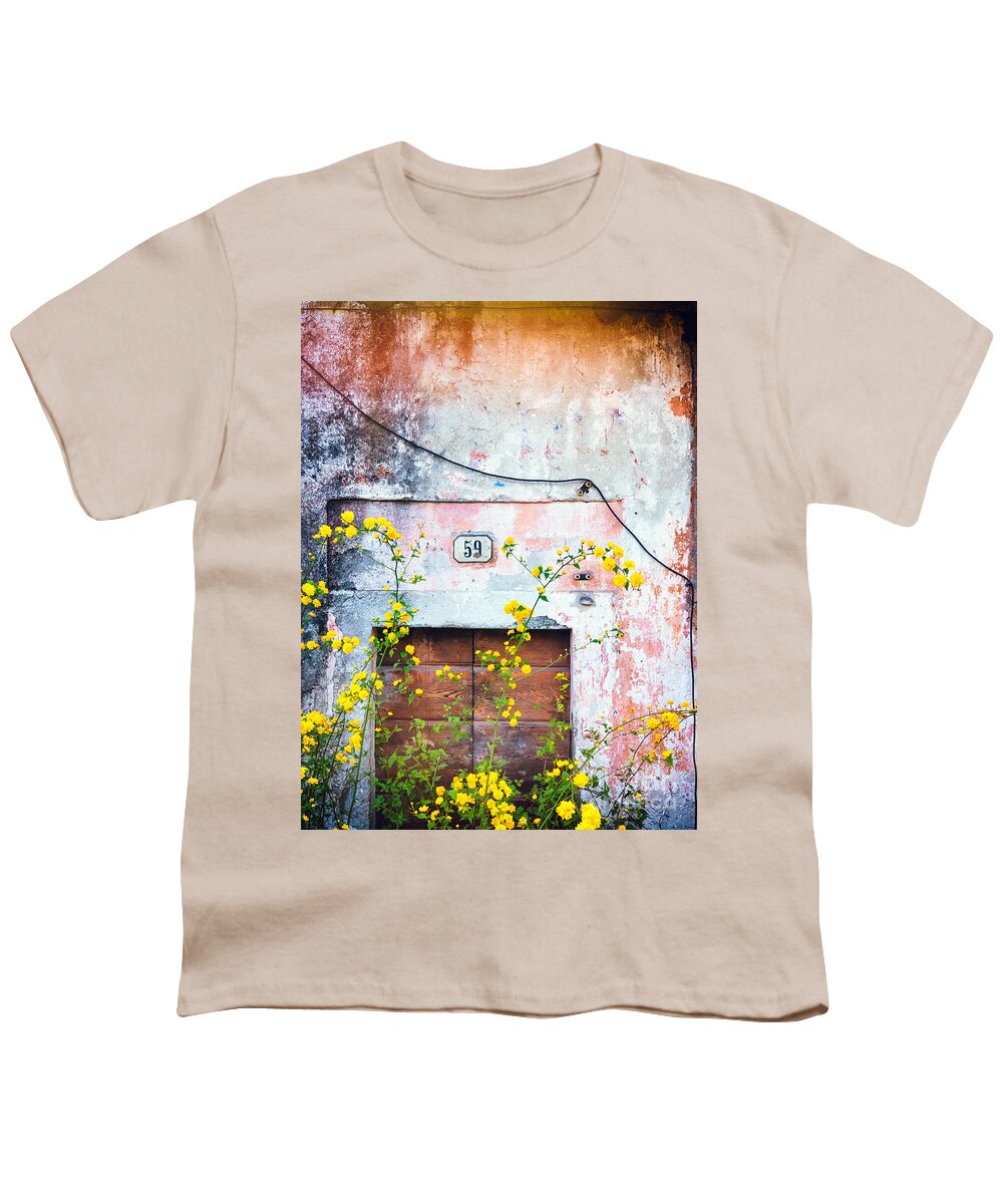Architecture Youth T-Shirt featuring the photograph Yellow flowers and decayed wall by Silvia Ganora