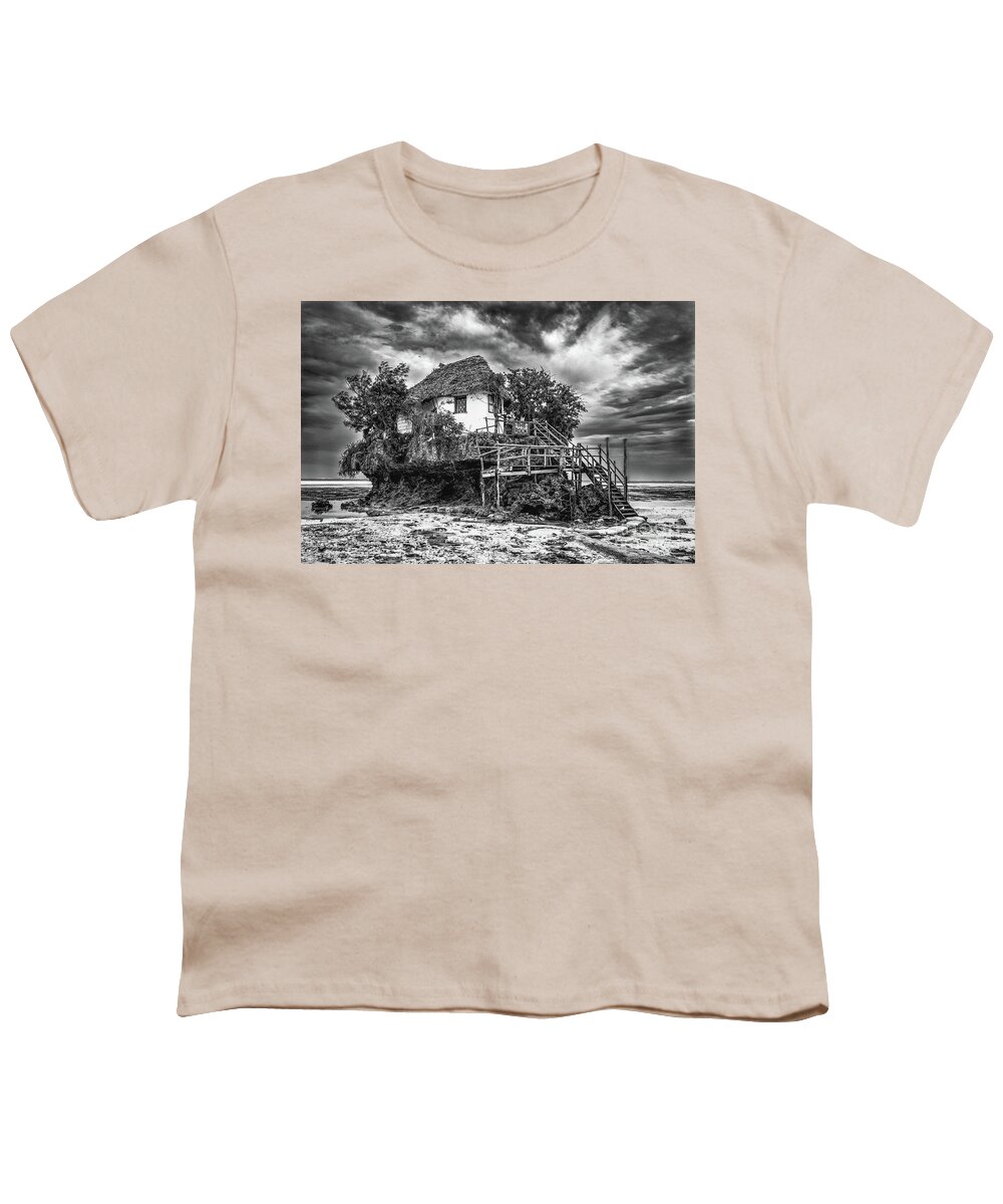 Bungalow Youth T-Shirt featuring the photograph The Rock, Zanzibar black and white by Lyl Dil Creations