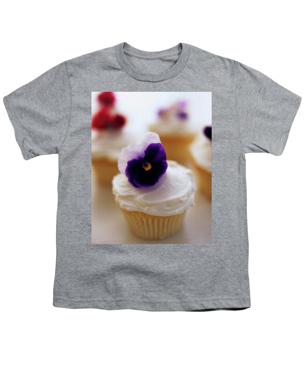 Bridal Youth T-Shirt featuring the photograph A Cupcake With A Violet On Top by Romulo Yanes