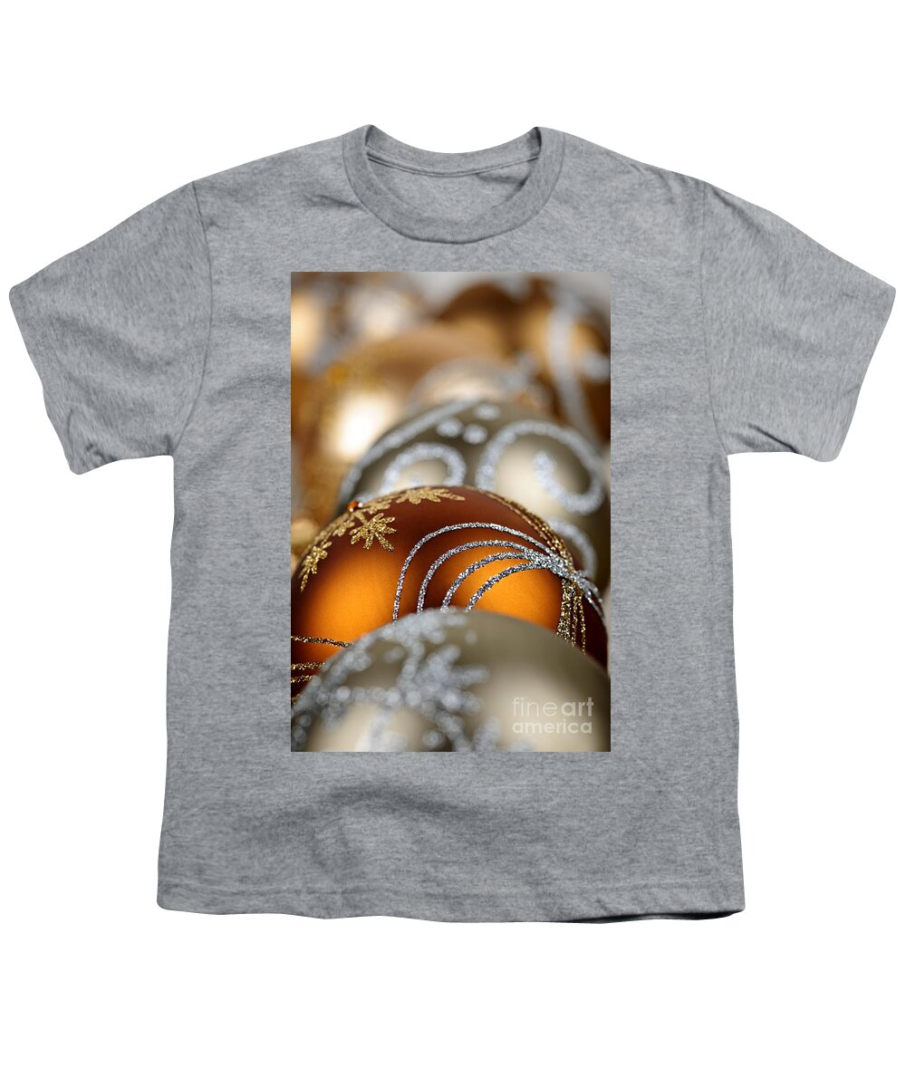 Christmas Youth T-Shirt featuring the photograph Gold Christmas ornaments by Elena Elisseeva