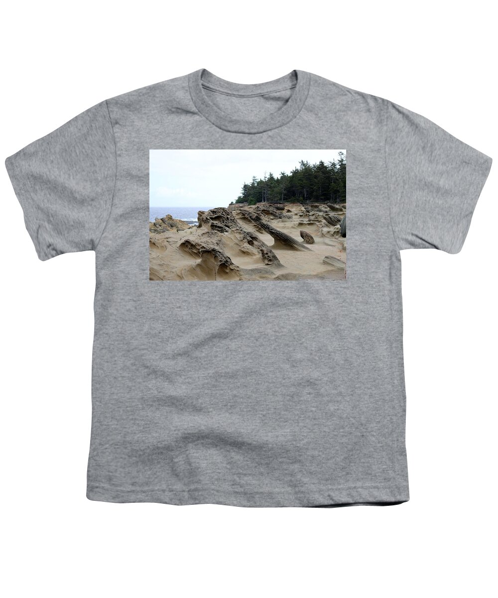 Oregon Youth T-Shirt featuring the photograph Carved Sandstone along the Oregon Coast by Christy Pooschke