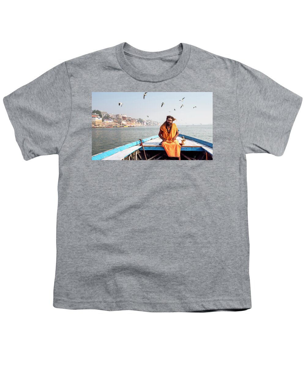 Asia Youth T-Shirt featuring the photograph Sadhu in a boat. by Usha Peddamatham