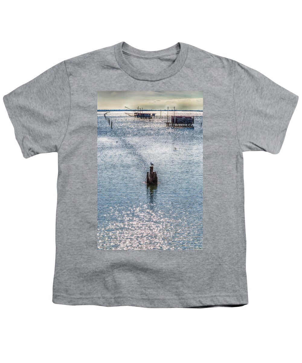 Emilia Youth T-Shirt featuring the photograph Seagull And Fishing Huts With Netfish by Vivida Photo PC