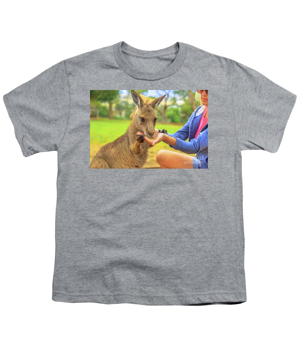 Kangaroos Youth T-Shirt featuring the photograph Woman with kangaroo #1 by Benny Marty
