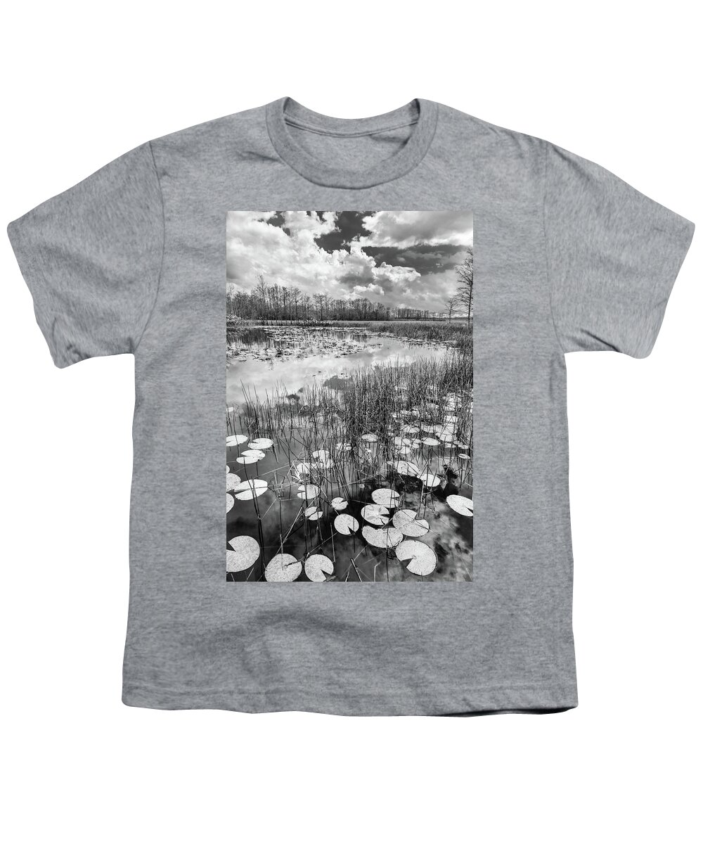Clouds Youth T-Shirt featuring the photograph Lily Pads Floating on the Glades in Black and White by Debra and Dave Vanderlaan