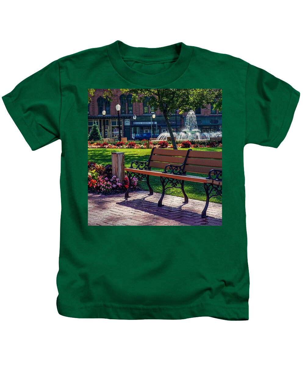  Kids T-Shirt featuring the photograph A seat in the park. by Kendall McKernon