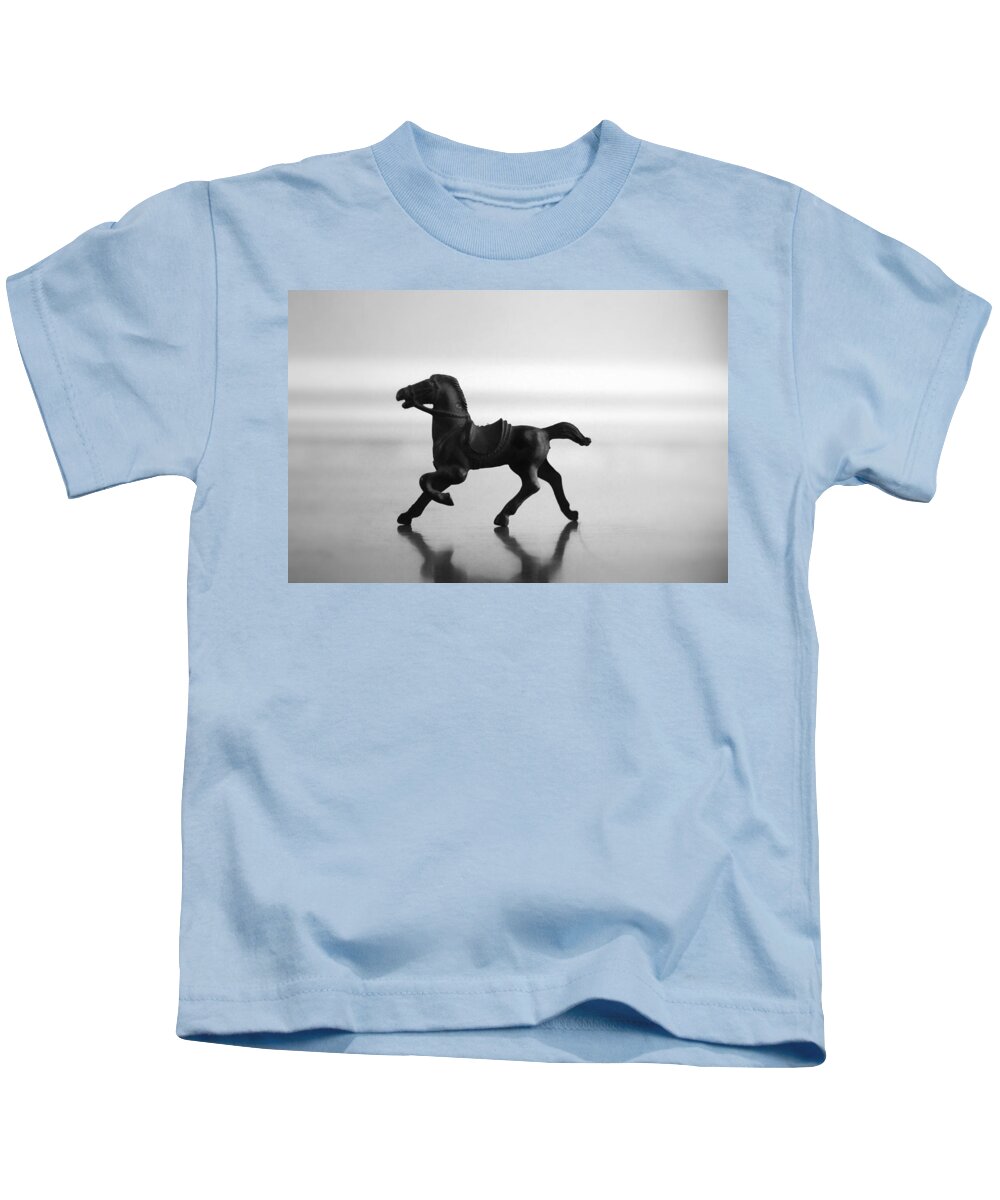 Kelly Hazel Kids T-Shirt featuring the photograph A Gallop Through the Imagination in Black and White by Kelly Hazel