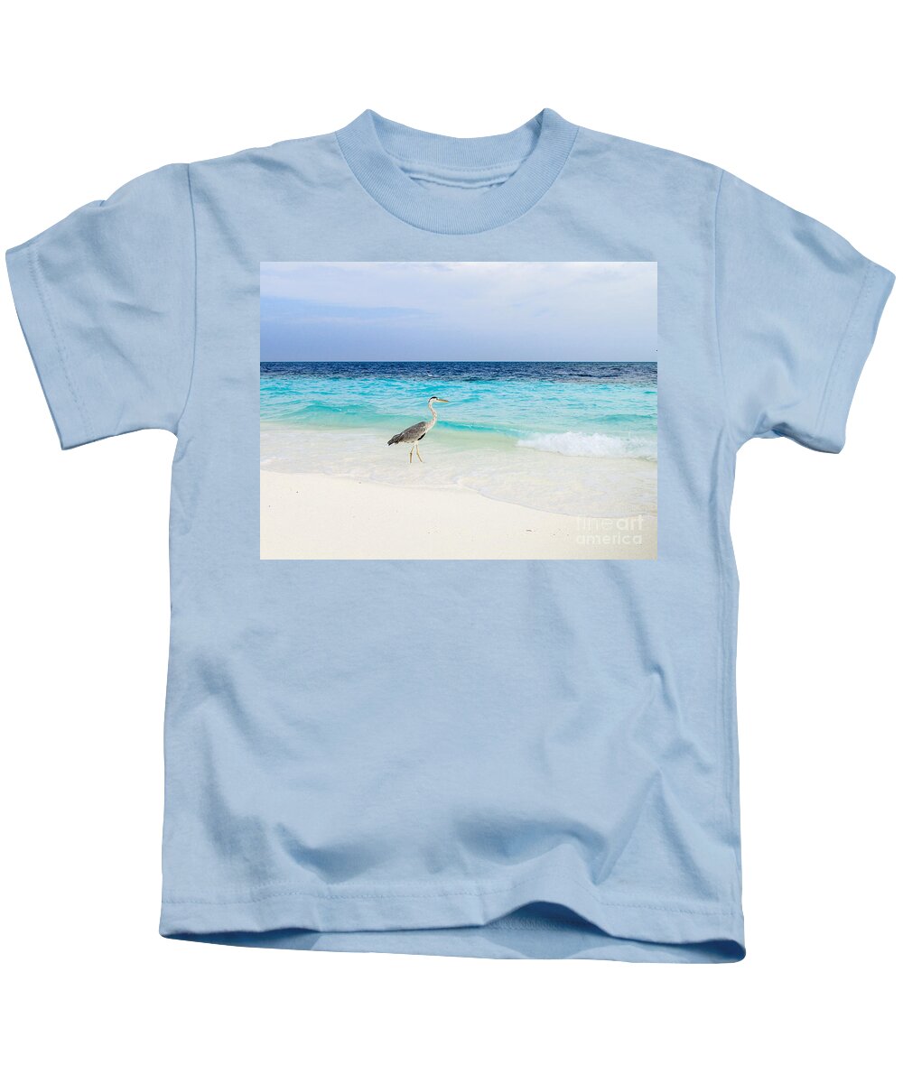 Animal Kids T-Shirt featuring the photograph Heron Takes A Walk At The Beach by Hannes Cmarits
