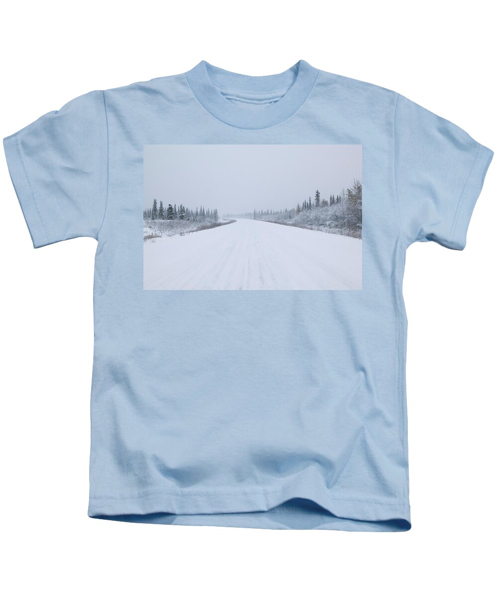 Photography Kids T-Shirt featuring the photograph Highway Passing Through A Snow Covered by Panoramic Images