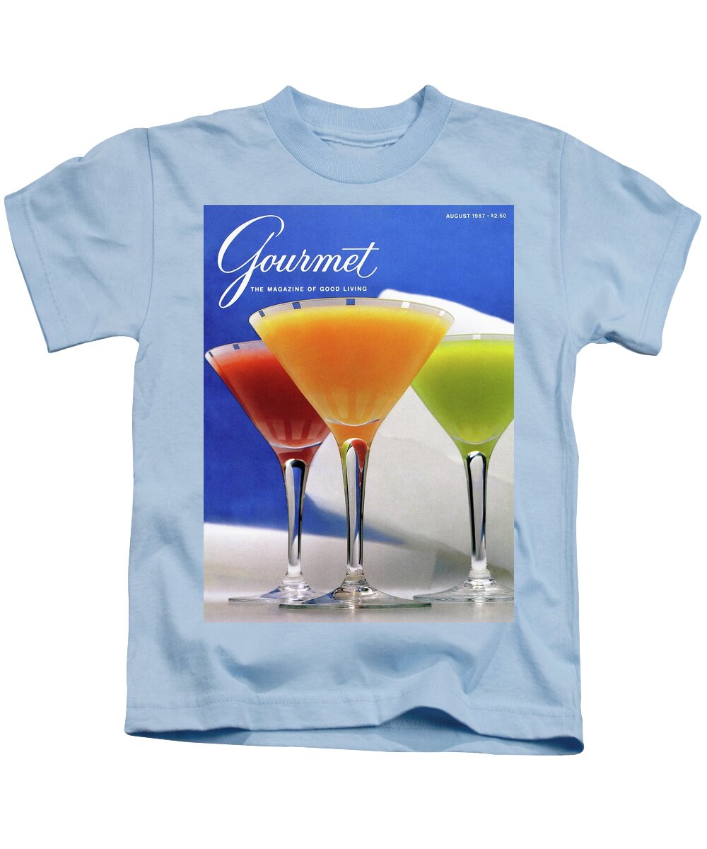 Foodcovermagazinegourmetsummerseasonscocktailglassalcoholdrinkalcoholic Beveragebeveragestrawberry Banana Margaritafrozen Mango Daiquirifrozen Melon Coladacolorfulnobody #condenastgourmetcover August 1st 1987 Kids T-Shirt featuring the photograph Summer Cocktails by Romulo Yanes